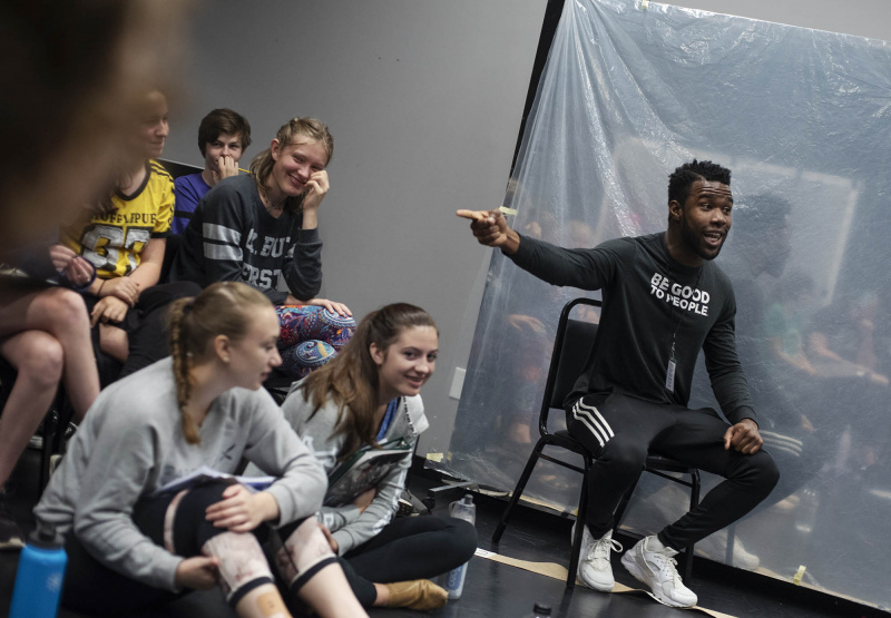 Chaundre Hall-Broomfield, who plays Hercules Mulligan and James Madison in the touring production of Hamilton, works with students in an acting masterclass in a weeklong Hamilton Intensive camp in The Addy dance studio at Proctors Tuesday, August 20, 2019. Photo by Kate Penn - Proctors