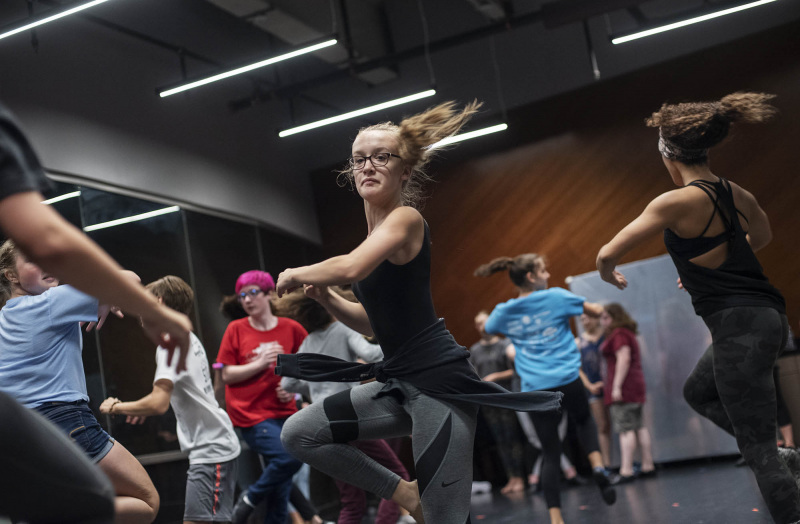 Natalie Kaye Clater, a member of the ensemble in the touring production of Hamilton, works with students in a dance masterclass in a weeklong Hamilton Intensive camp in The Addy dance studio at Proctors Tuesday, August 20, 2019. Photo by Kate Penn - Proctors