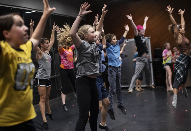 Natalie Kaye Clater, a member of the ensemble in the touring production of Hamilton, works with students in a dance masterclass in a weeklong Hamilton Intensive camp in The Addy dance studio at Proctors Tuesday, August 20, 2019. Photo by Kate Penn - Proctors
